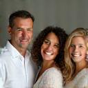 The Thompson family smiling